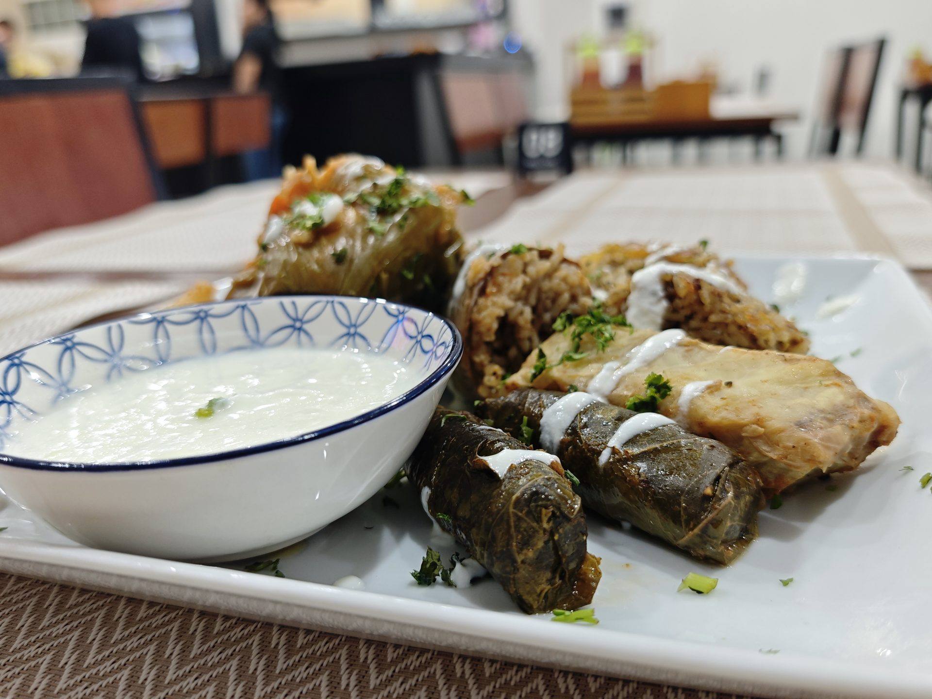 Dolma served with a fresh yogurt salad